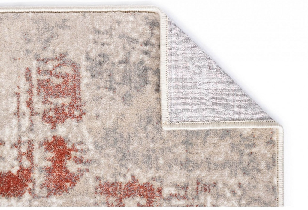 Colt indoit al covorului modern crem bej, evidentiind grosimea si calitatea materialului