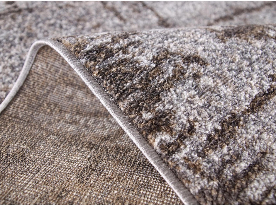 Detaliu covor antiderapant maro pentru living modern, finisaj premium si textura confortabila