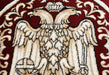 Detaliu vultur bicefal pe covor bisericesc rotund grena, simbol traditional ortodox