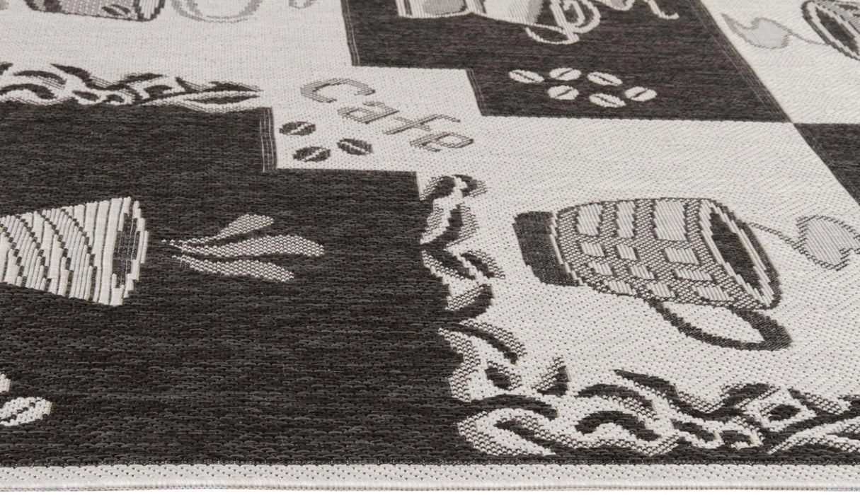 Detaliu covor bucatarie gri cu model cafea si ceasca, covor modern pentru bucatarie