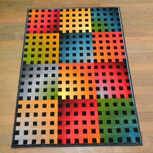 Covor camera copii cu model geometric multicolor, perfect pentru un decor vesel si modern.