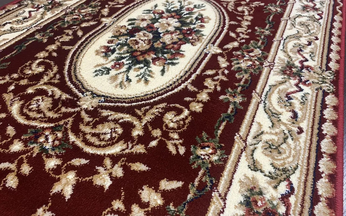 Detaliu central covor clasic oval floral grena cu motive florale elegante