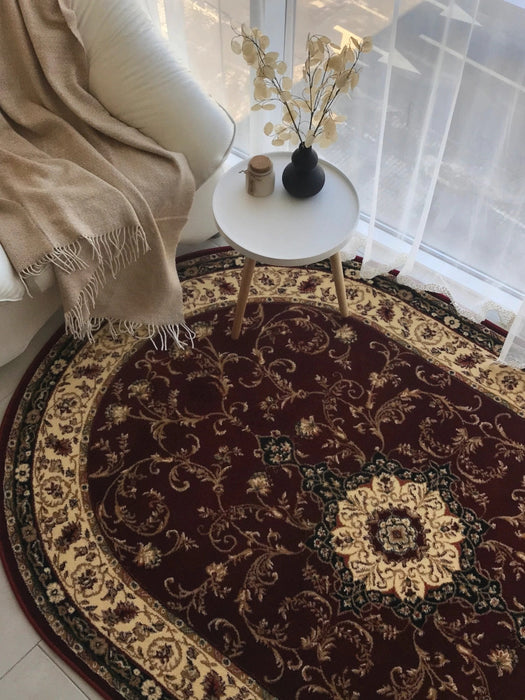 Covor clasic oval grena integrat într-un decor elegant de interior