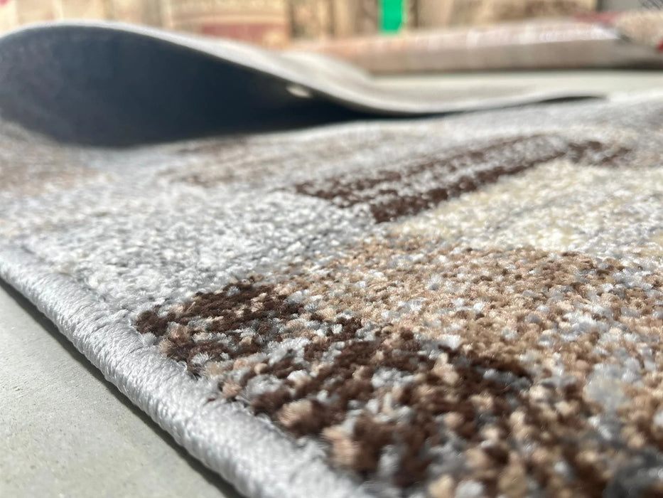 Detaliu textura covor gri maro cu design geometric modern