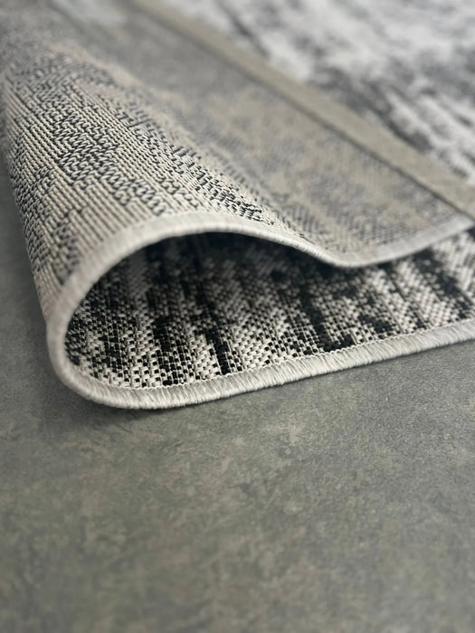 covor gri modern rulat material durabil covor rezistent si usor de intretinut