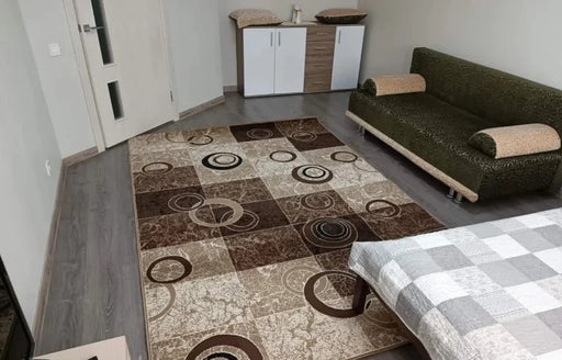 Covor living modern bej maro cu model geometric cercuri pentru decor contemporan