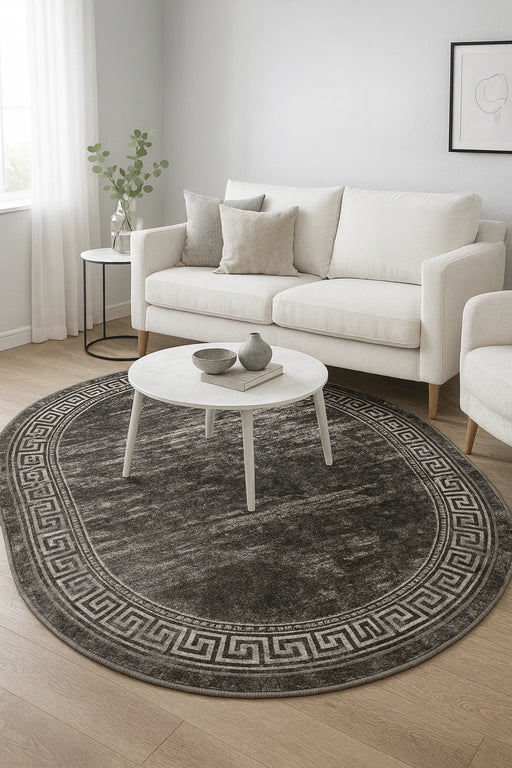 Covor modern abstract oval gri închis în living, potrivit pentru decor contemporan și minimalist