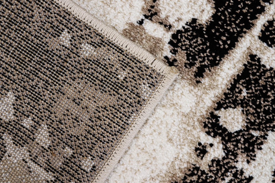 Covor modern crem bej cu baza rezistenta si design abstract contemporan