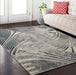 Covor modern crem gri cu model abstract asezat in living, design elegant si nuante greige contemporane