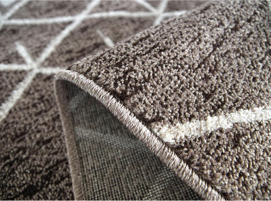 Detaliu textura covor modern geometric bej maro cu fir dens