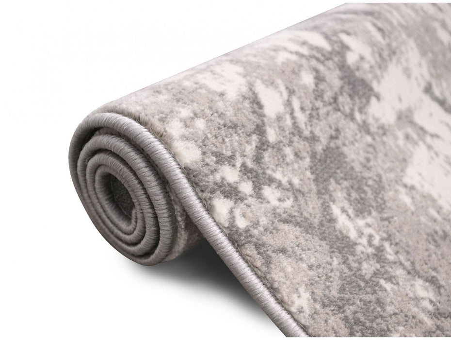 Covor modern gri bej rulat, material dens si rezistent pentru utilizare zilnica