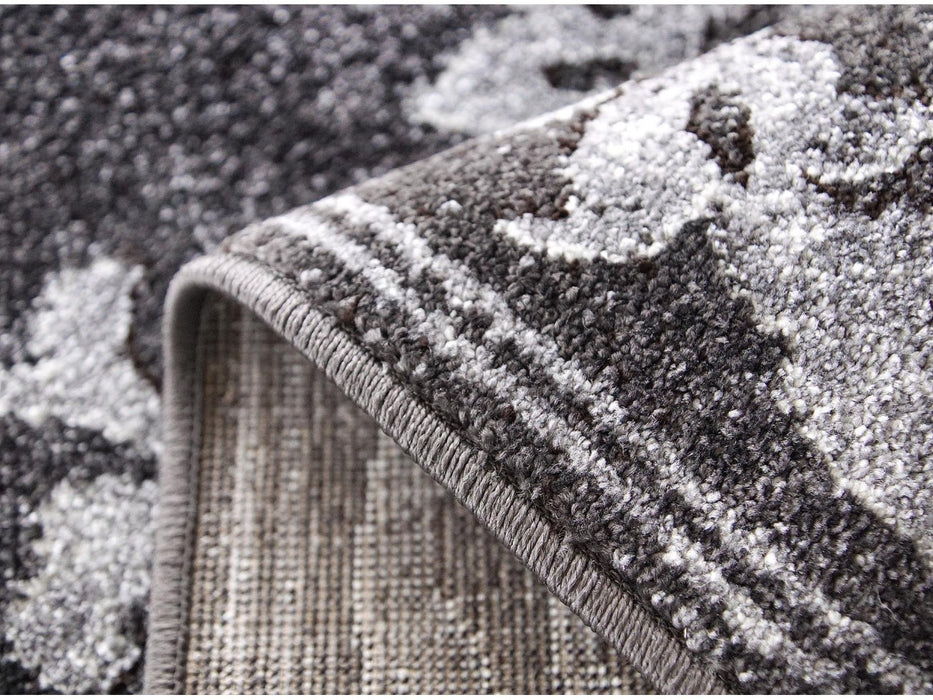 detaliu margine covor modern gri, grosime si calitate material rezistent