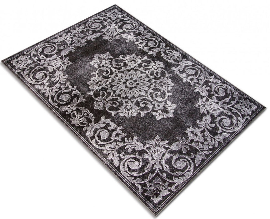 covor modern gri fotografiat din perspectiva, model abstract si nuante gri inchis deschis