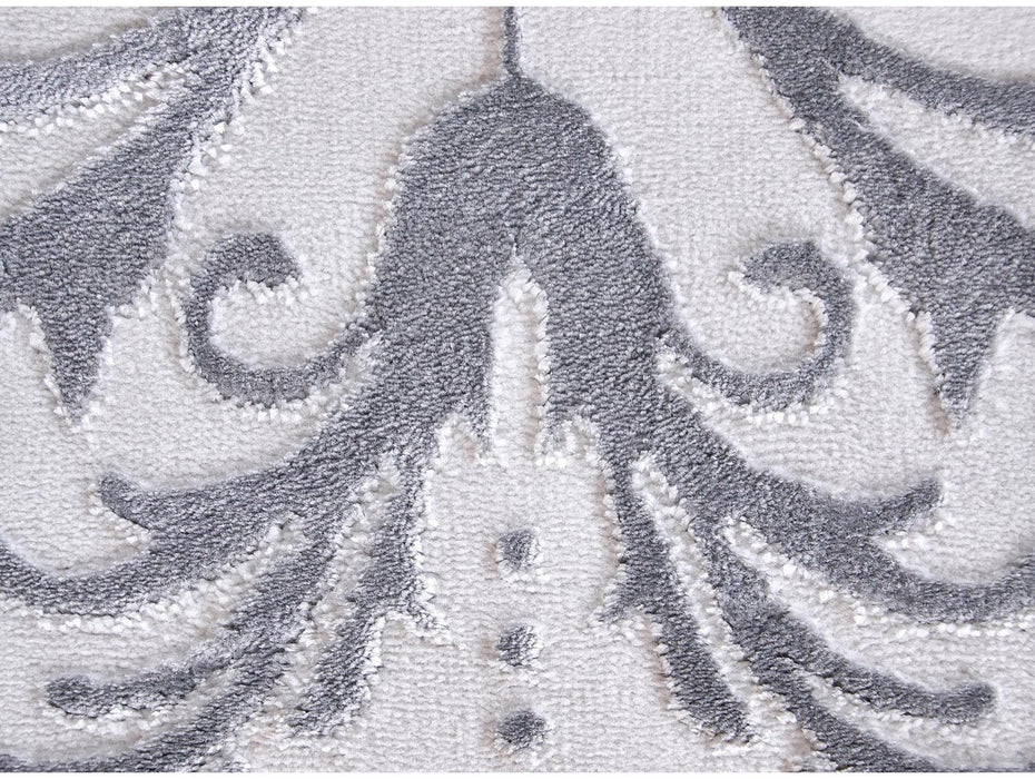 Textura covor gri cu model fin si fibre moi, confortabil si usor de intretinut

