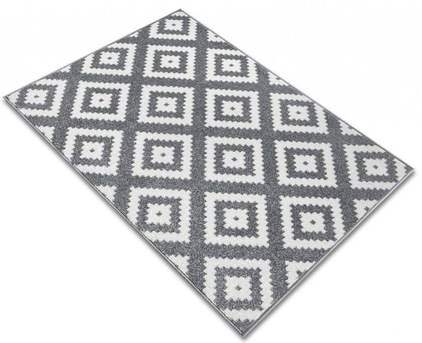 Covor modern pentru living cu motive geometrice si aspect premium pentru orice incapere.