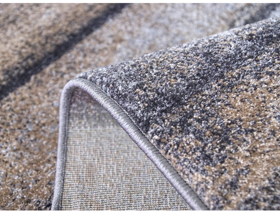 Covor modern rulat, detalii material moale si rezistent, ideal pentru living si dormitor