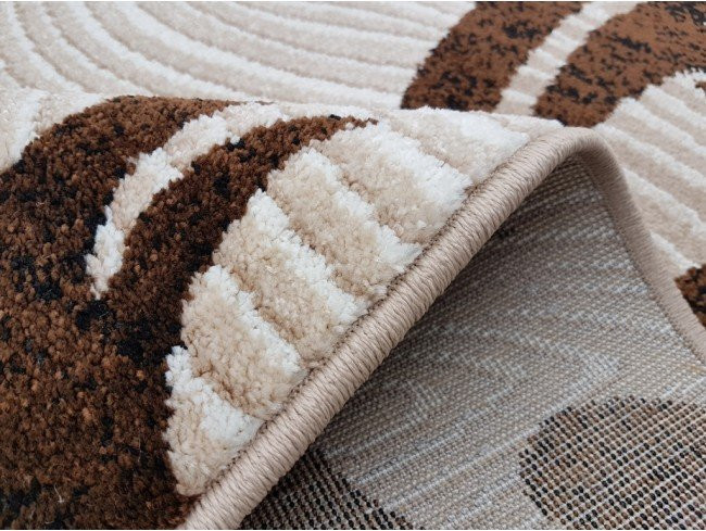 Covor oval crem cu maro fir inalt si margini finisate pentru living