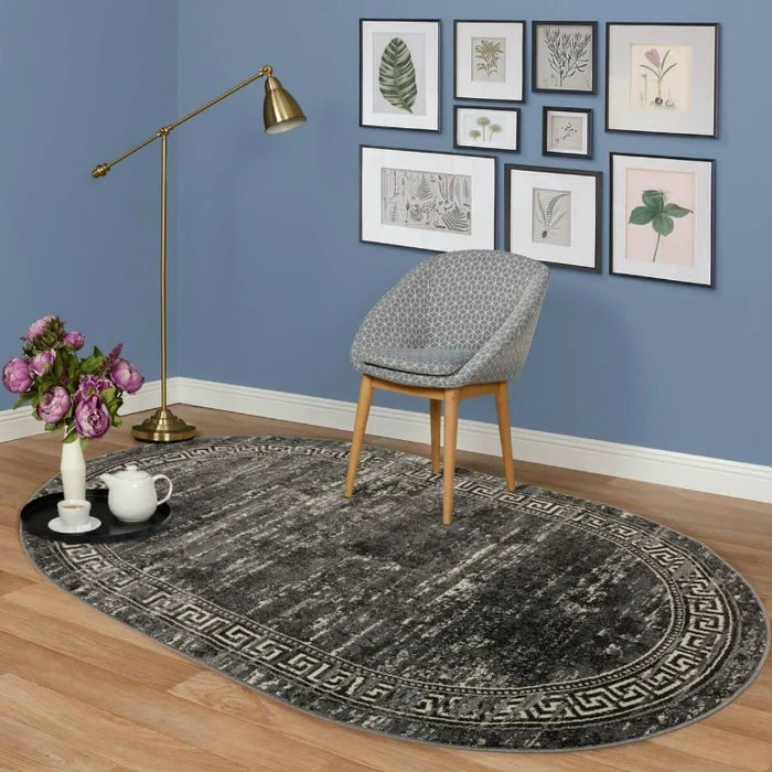 Covor oval modern gri închis integrat într-un interior elegant