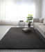 Covor pufos gri inchis pentru living, stil elegant, tip blanita, perfect pentru decor modern si confort
