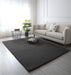 Covor pufos gri inchis pentru living, tip blanita, design modern si elegant, ideal pentru orice interior