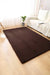 Covor pufos maro pentru living, tip blanita, design modern si elegant, ideal pentru un ambient cald