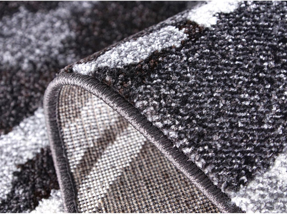 Partea din spate a covorului gri cu baza rezistenta si stabilitate sporita pe podea