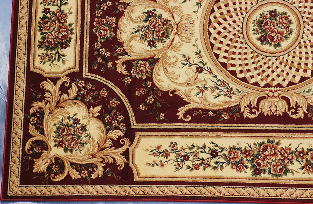 Detaliu colț și ornament pe covor clasic floral grena