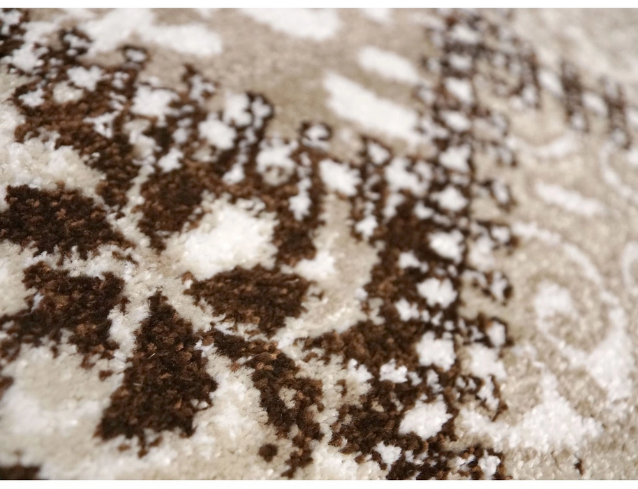 Detaliu textura covor crem maro model patchwork fir placut la atingere