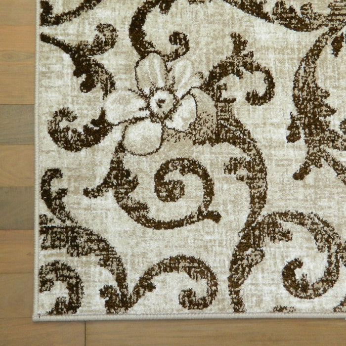 Detaliu covor bej maro cu model floral modern