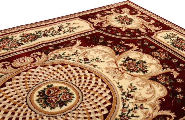 Detaliu margine și finisaj covor clasic floral grena