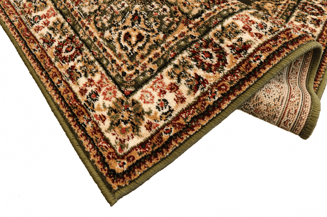 Detaliu margine și finisaj covor clasic verde