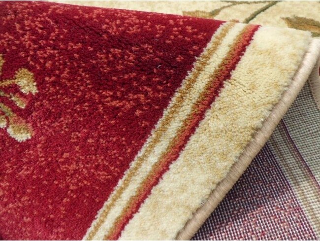 detaliu margine covor modern floral crem cu grena