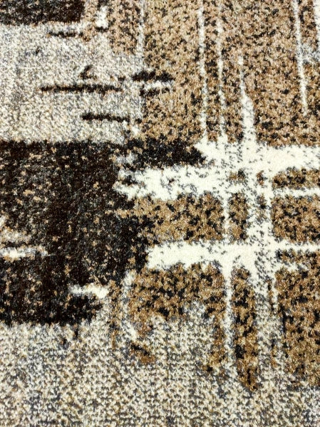 Detaliu margine și finisaj covor modern gri maro