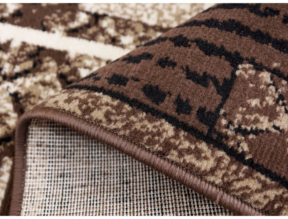 detaliu margine si finisaj covor modern maro bej