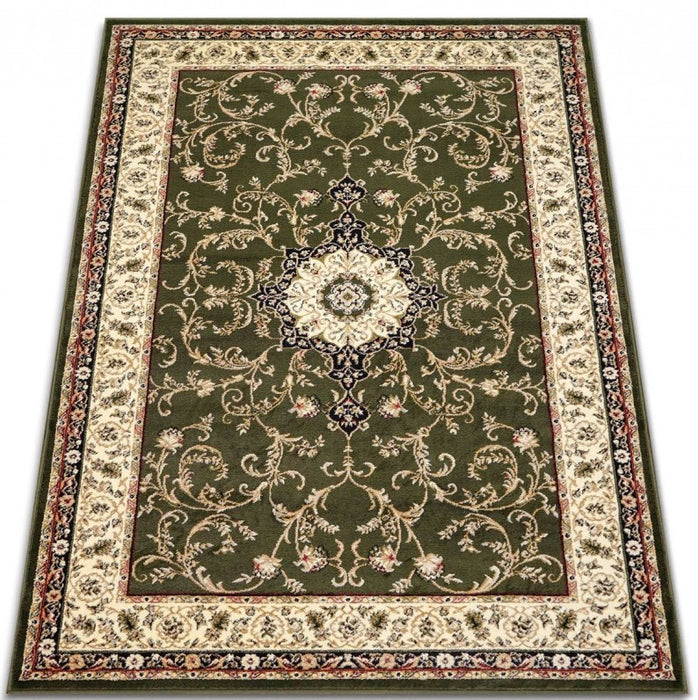 Detaliu medalion ornamental pe covor clasic verde