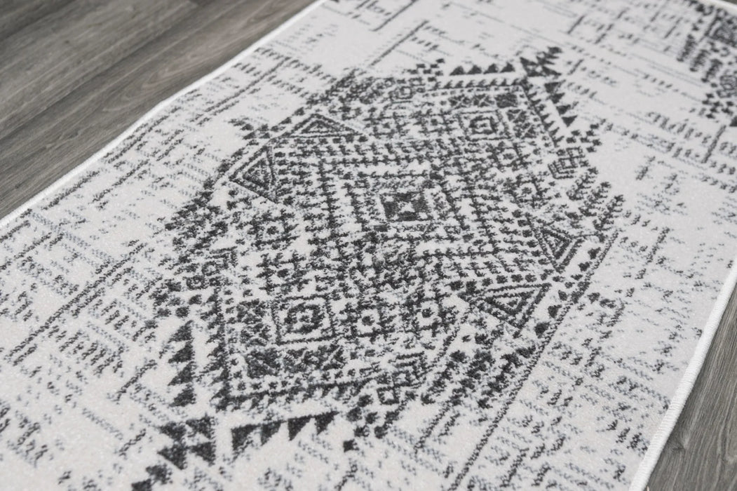 Detaliu model abstract pe covor modern gri