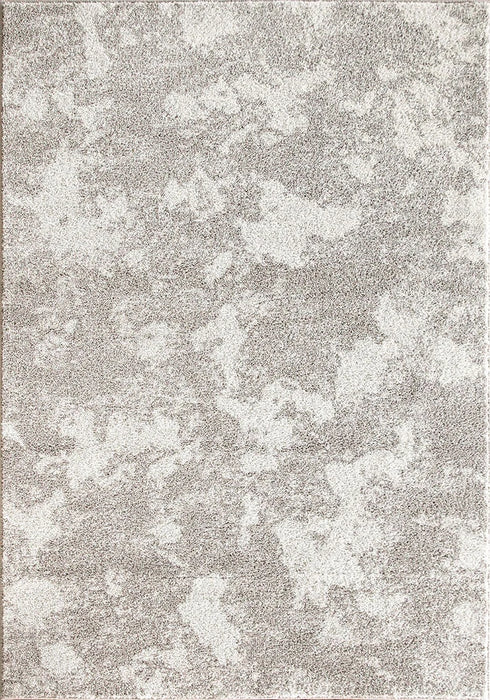 detaliu model discret pe covor crem bej