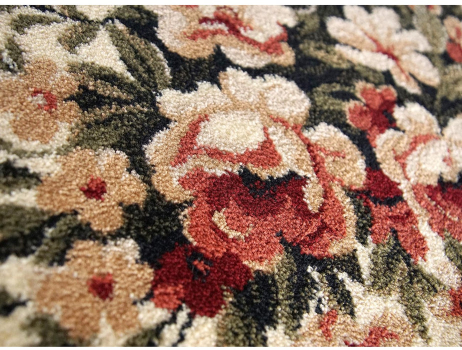 detaliu model floral pe covor clasic grena