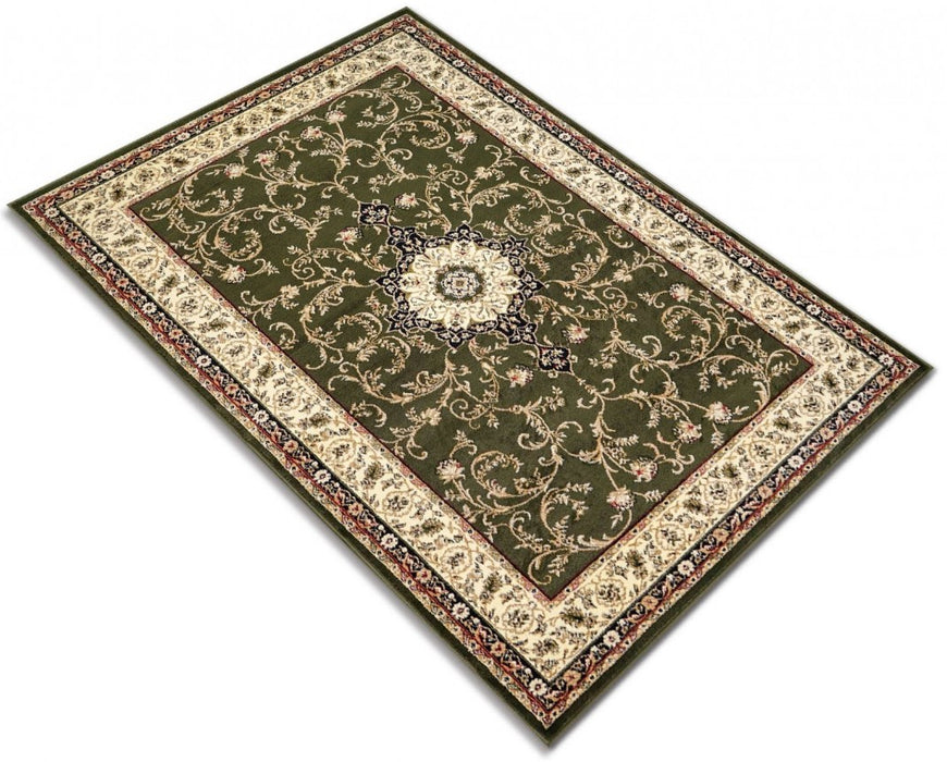 Detaliu model floral pe covor clasic verde