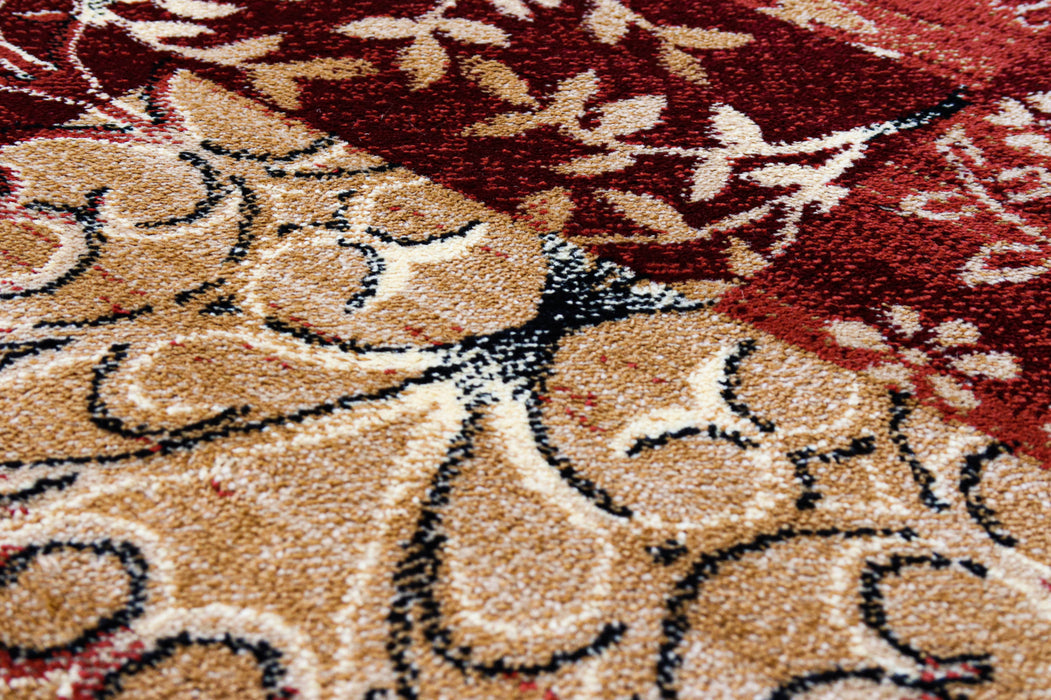 Detaliu model floral pe covor modern grena