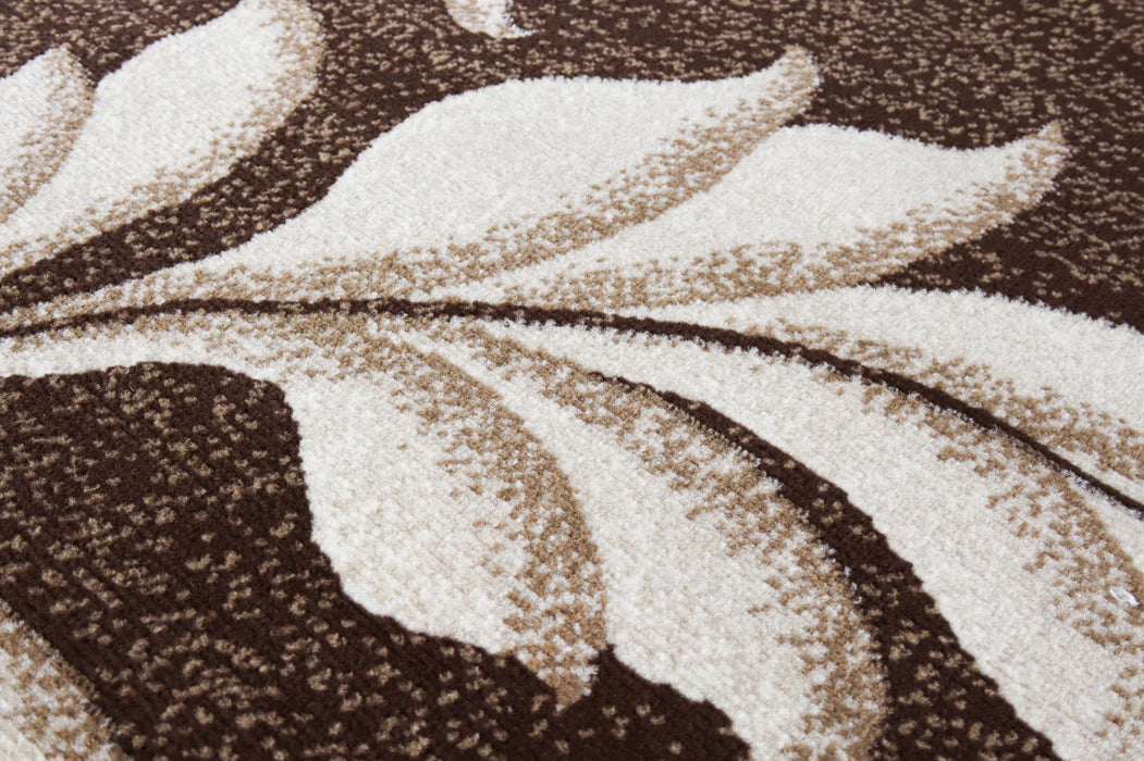 detaliu model floral covor modern maro bej