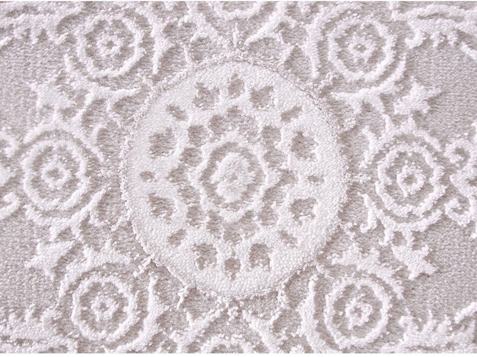 Detaliu model ornamental cu medalion crem, textura fina si relief elegant, covor clasic premium pentru living sau dormitor