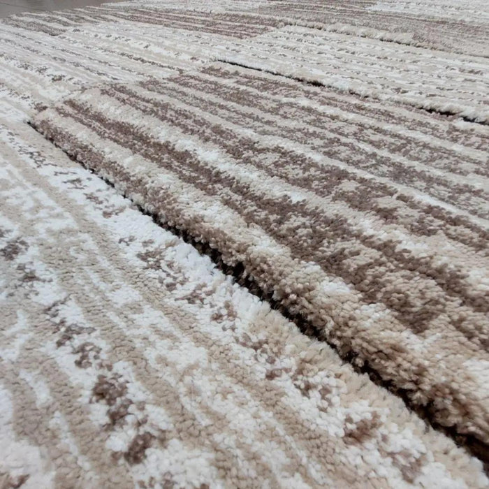 Detaliu textură covor modern geometric oval crem maro