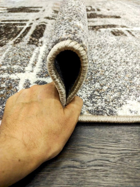 Detaliu textură moale covor modern gri maro