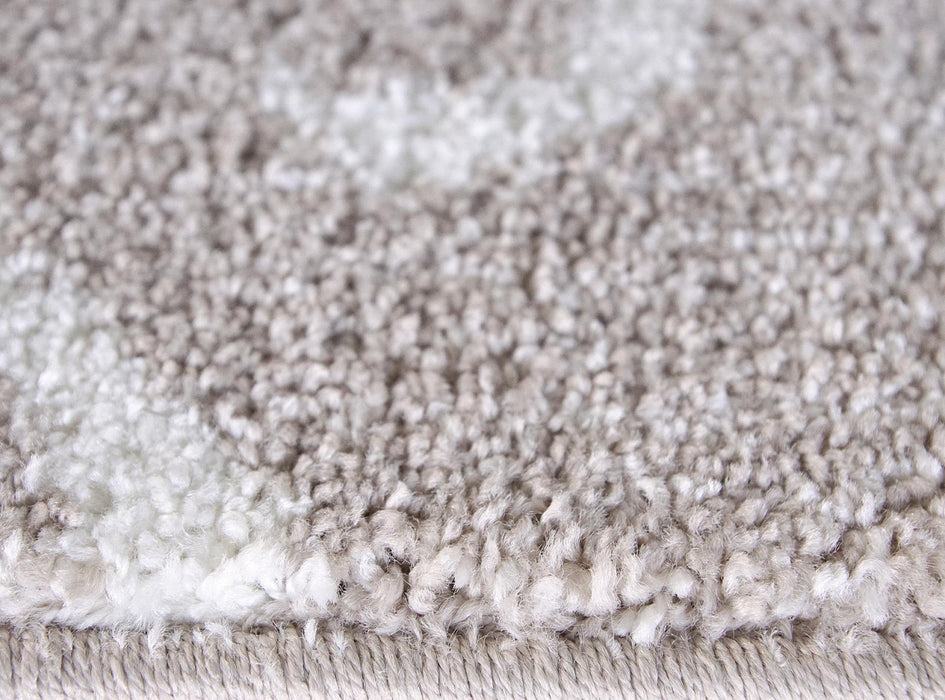 detaliu textura si fir moale pe covor crem bej clasic