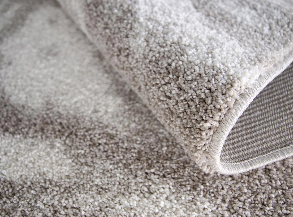 detaliu textura firului pe covor crem bej pufos