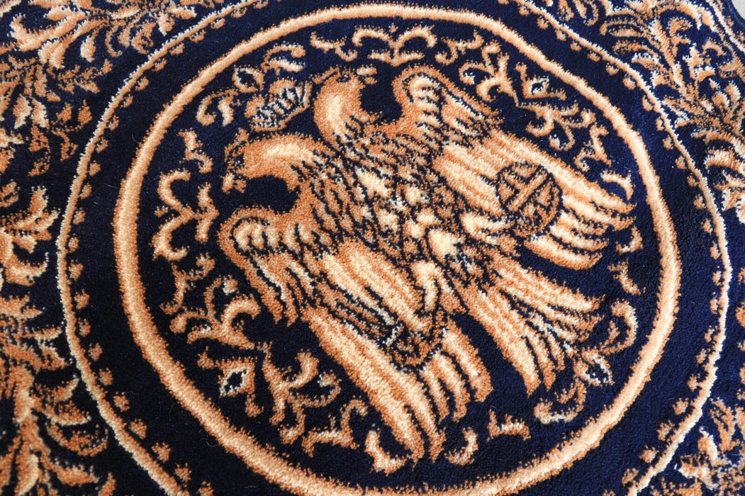 Detaliu vultur bicefal pe covor bisericesc, culoare albastru