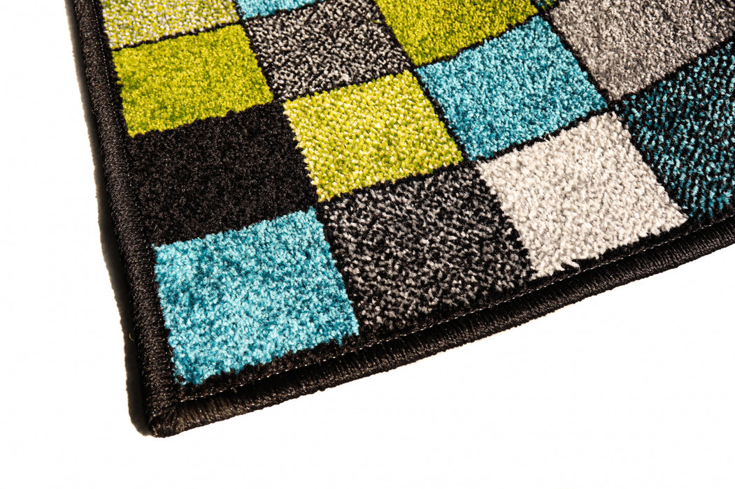 Detaliu finisaj al unui covor modern multicolor cu model geometric si aspect premium.