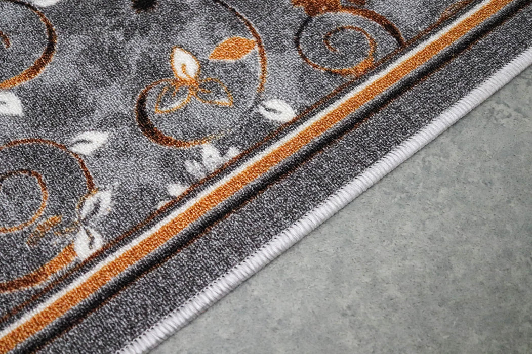 Detaliu baza traversa covor gri cu suport pasla, aderenta buna si stabilitate pe podea