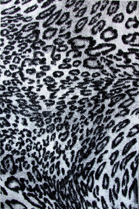Detaliu model leopard pe un covor modern pentru living cu aspect decorativ si elegant.